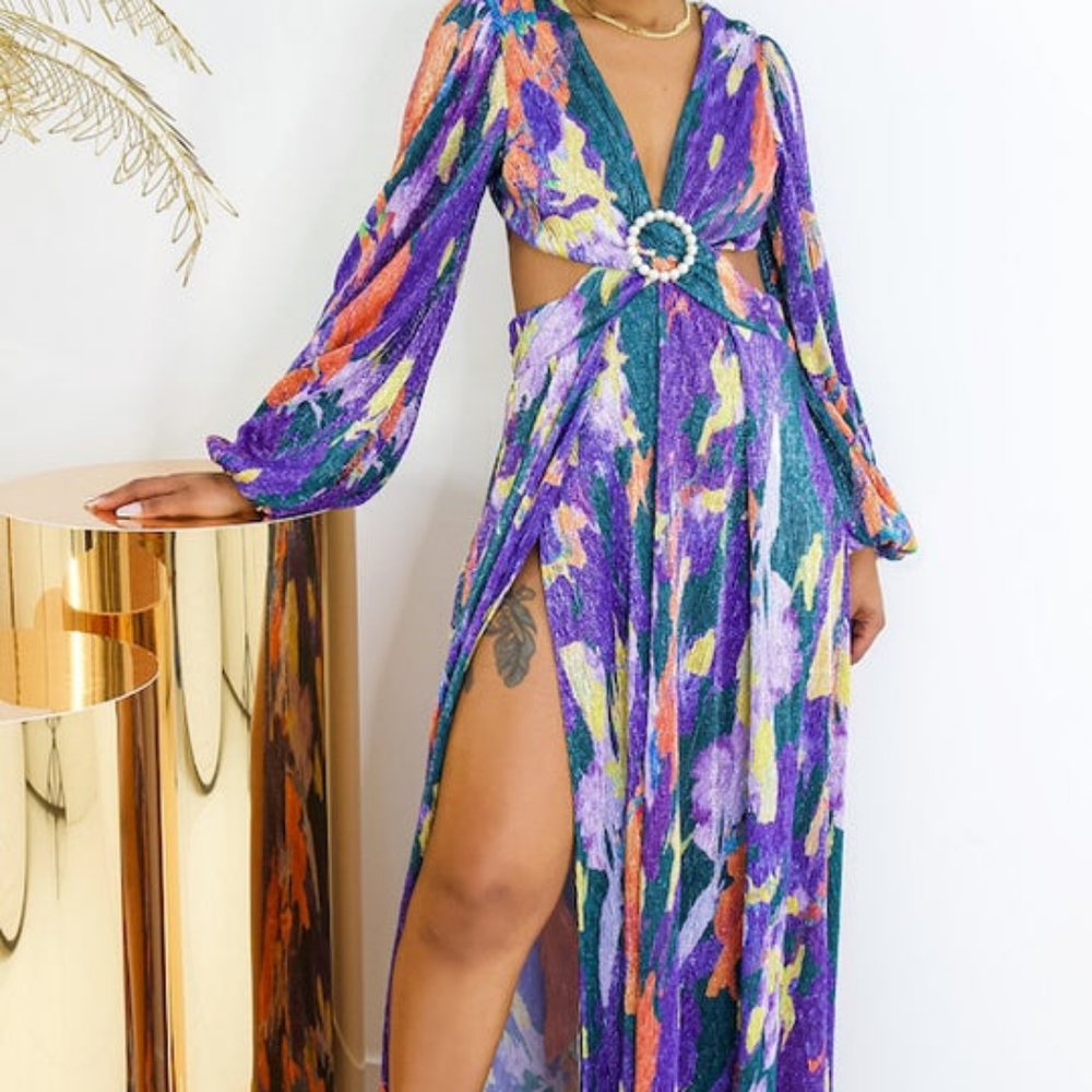 Cute dress with sexy side cut-outs that add flare and flirtation